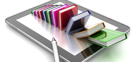 Cette image montre un photomontage montrant des livres s'enfonçant dans un iPad. © Fotolia